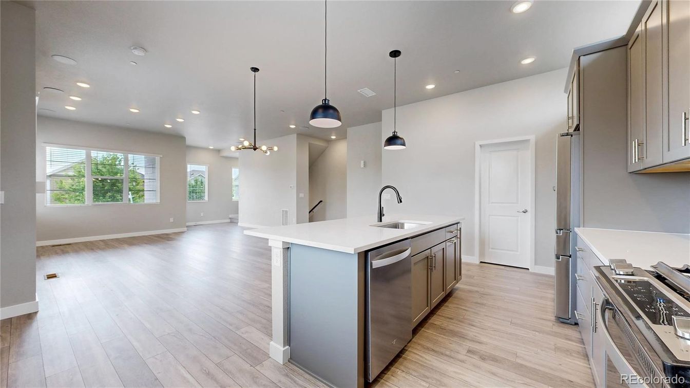 Interior, Kitchen, Pendant Lights, Recessed Lighting, Stainless Steel Appliances, Wood Texture Flooring
