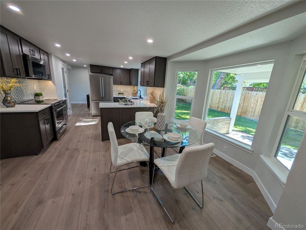 Dining room, Interior, Kitchen, Recessed Lighting, Stainless Steel Appliances, Wood Texture Flooring