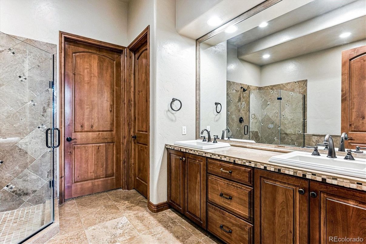 Bathroom, Dual Sink Vanities, Glass Shower, Interior, Recessed Lighting, Tile Countertops