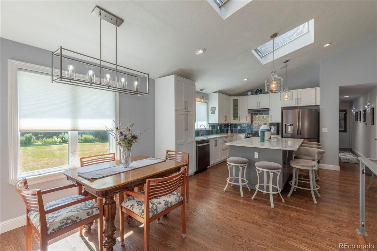Dining room, Interior, Kitchen, Pendant Lights, Recessed Lighting, Stainless Steel Appliances, Wood Texture Flooring
