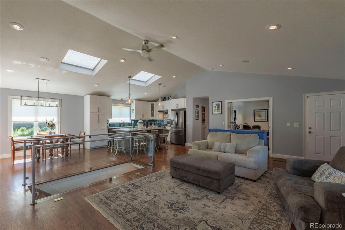 Dining room, Interior, Kitchen, Living room, Pendant Lights, Recessed Lighting, Stainless Steel Appliances, Wood Texture Flooring