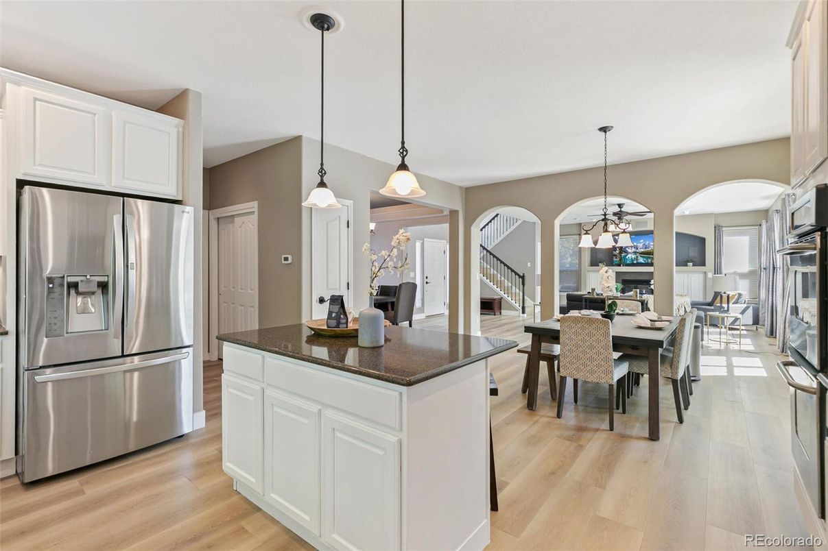 Dining room, Interior, Kitchen, Pendant Lights, Stainless Steel Appliances, Wood Texture Flooring