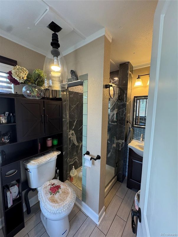 Bathroom, Glass Shower, Interior, Marble Walls, Wood Texture Flooring