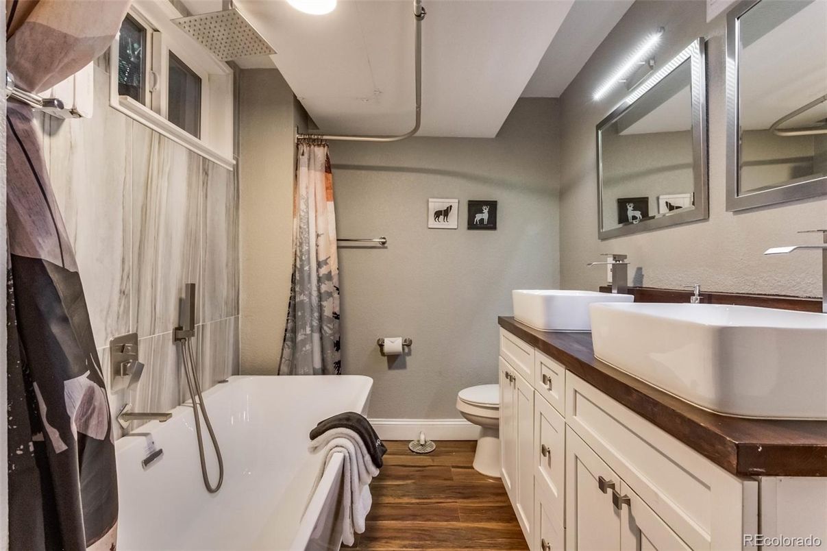 Bathroom, Dual Sink Vanities, Free Standing Baths, Interior, Wood Texture Flooring