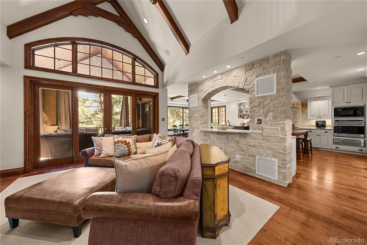 Interior, Kitchen, Living room, Recessed Lighting, Stainless Steel Appliances, Stone Walls, Wooden Beams, Wood Texture Flooring