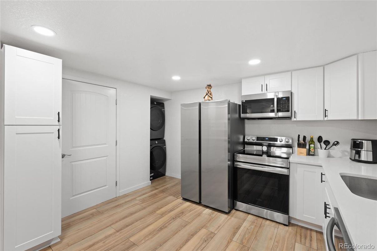 Interior, Kitchen, Recessed Lighting, Stainless Steel Appliances, Wood Texture Flooring