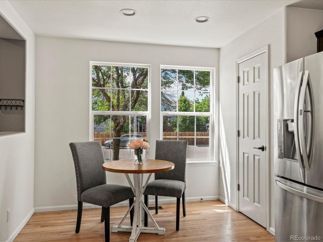 Dining room, Interior, Kitchen, Recessed Lighting, Stainless Steel Appliances, Wood Texture Flooring