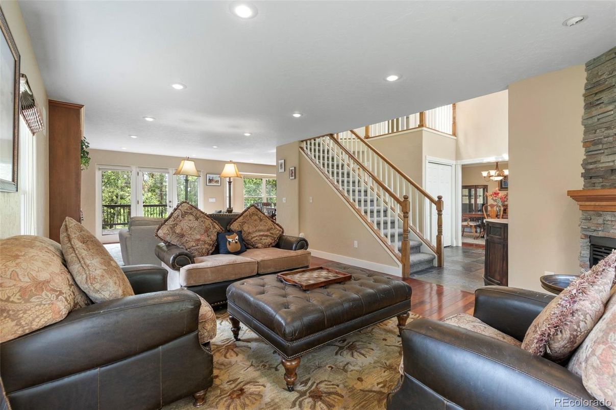 Chandelier, Fireplace, Interior, Living room, Recessed Lighting, Wood Texture Flooring