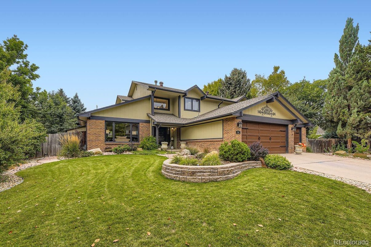 Attached, Backyard, Exterior, Facade, Brick Facade, Split Level