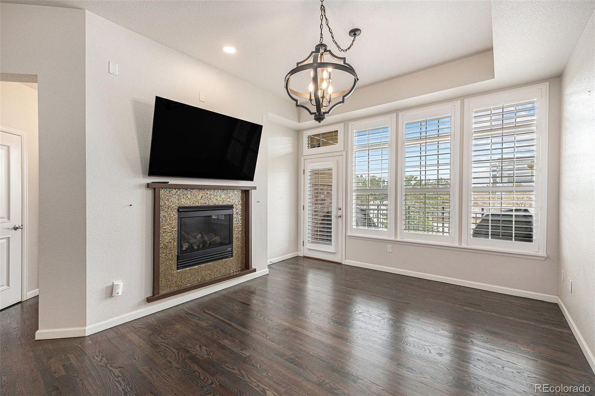 Empty room, Fireplace, Interior, Pendant Lights, Recessed Lighting, Wood Texture Flooring