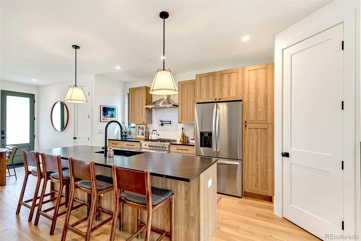 Interior, Kitchen, Pendant Lights, Recessed Lighting, Stainless Steel Appliances, Wood Texture Flooring