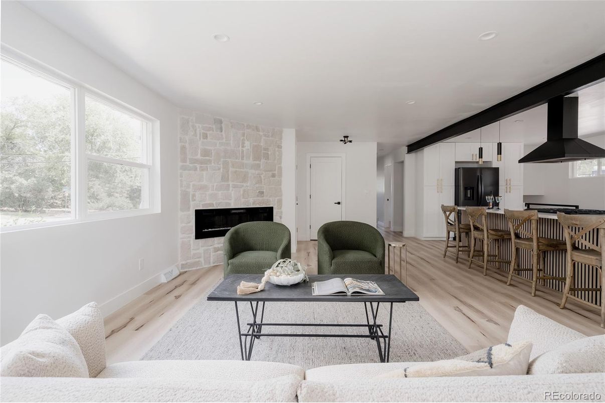 Fireplace, Interior, Kitchen, Living room, Pendant Lights, Recessed Lighting, Stone Walls, Wood Texture Flooring