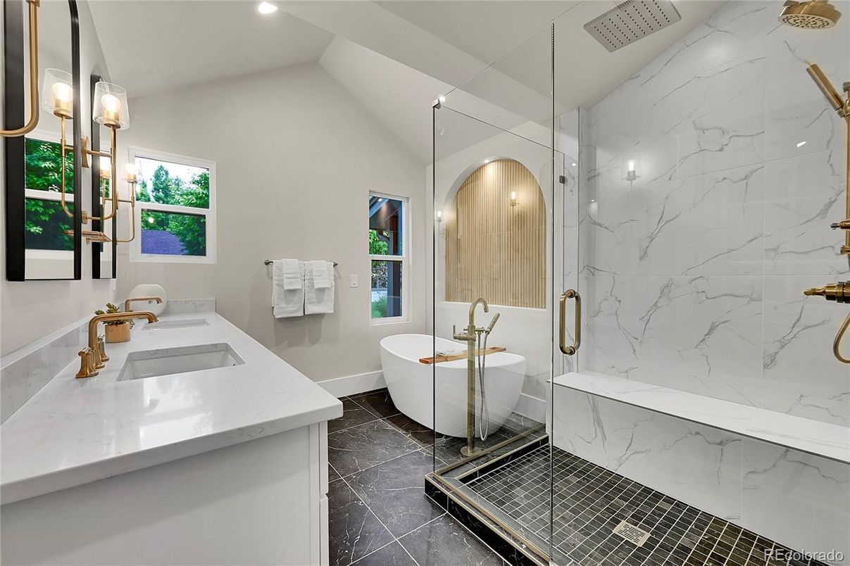 Bathroom, Dual Sink Vanities, Free Standing Baths, Glass Shower, Interior, Marble Walls, Recessed Lighting