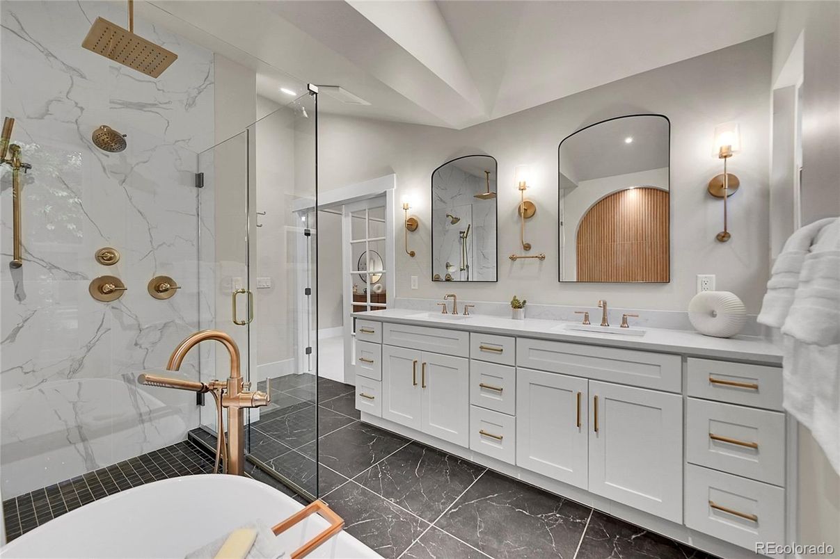 Bathroom, Dual Sink Vanities, Glass Shower, Interior, Marble, Marble Walls, Recessed Lighting
