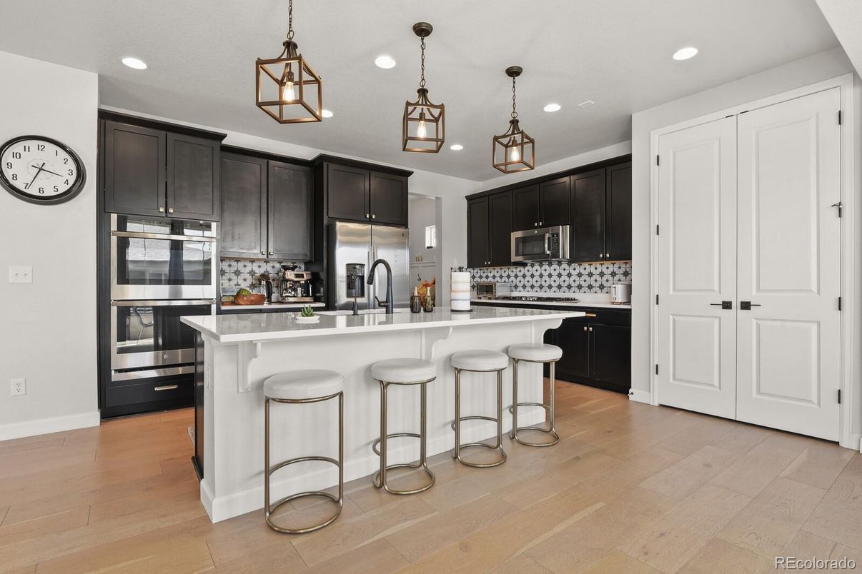 Interior, Kitchen, Pendant Lights, Recessed Lighting, Stainless Steel Appliances, Wood Texture Flooring