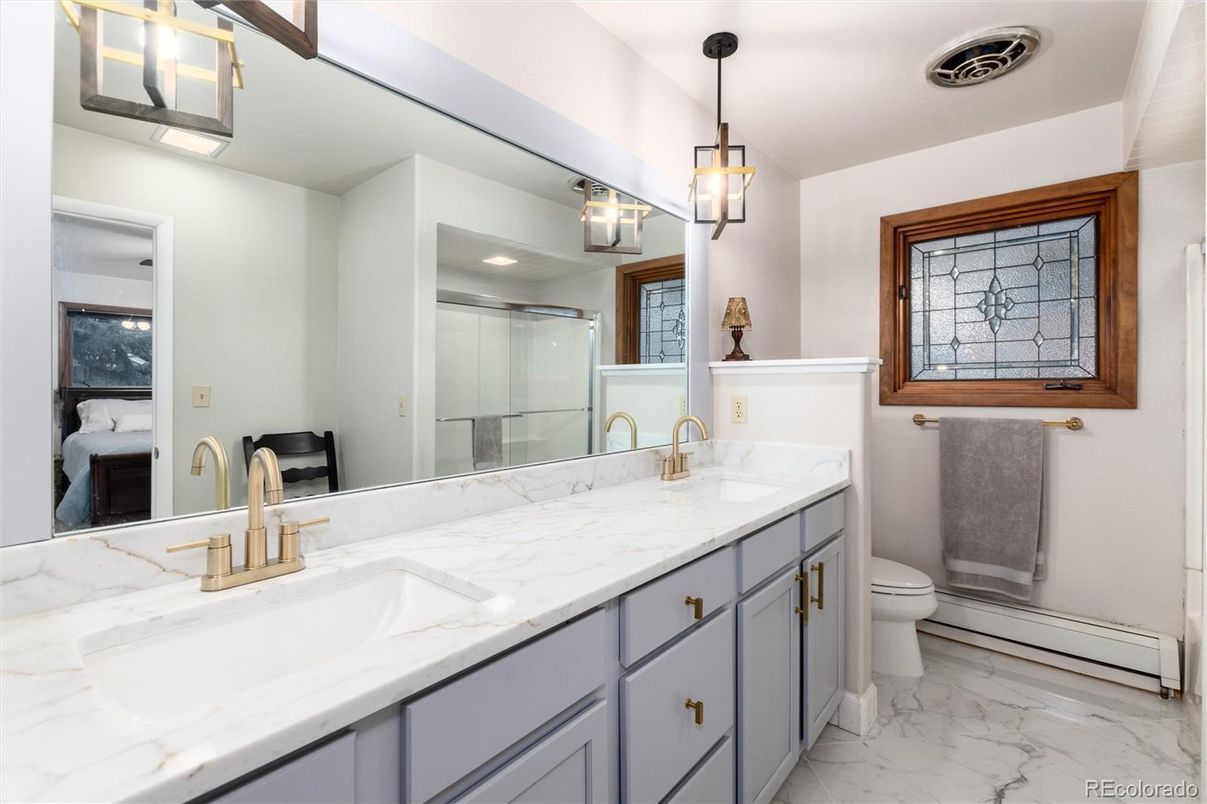 Bathroom, Dual Sink Vanities, Glass Shower, Interior, Marble, Pendant Lights, Recessed Lighting