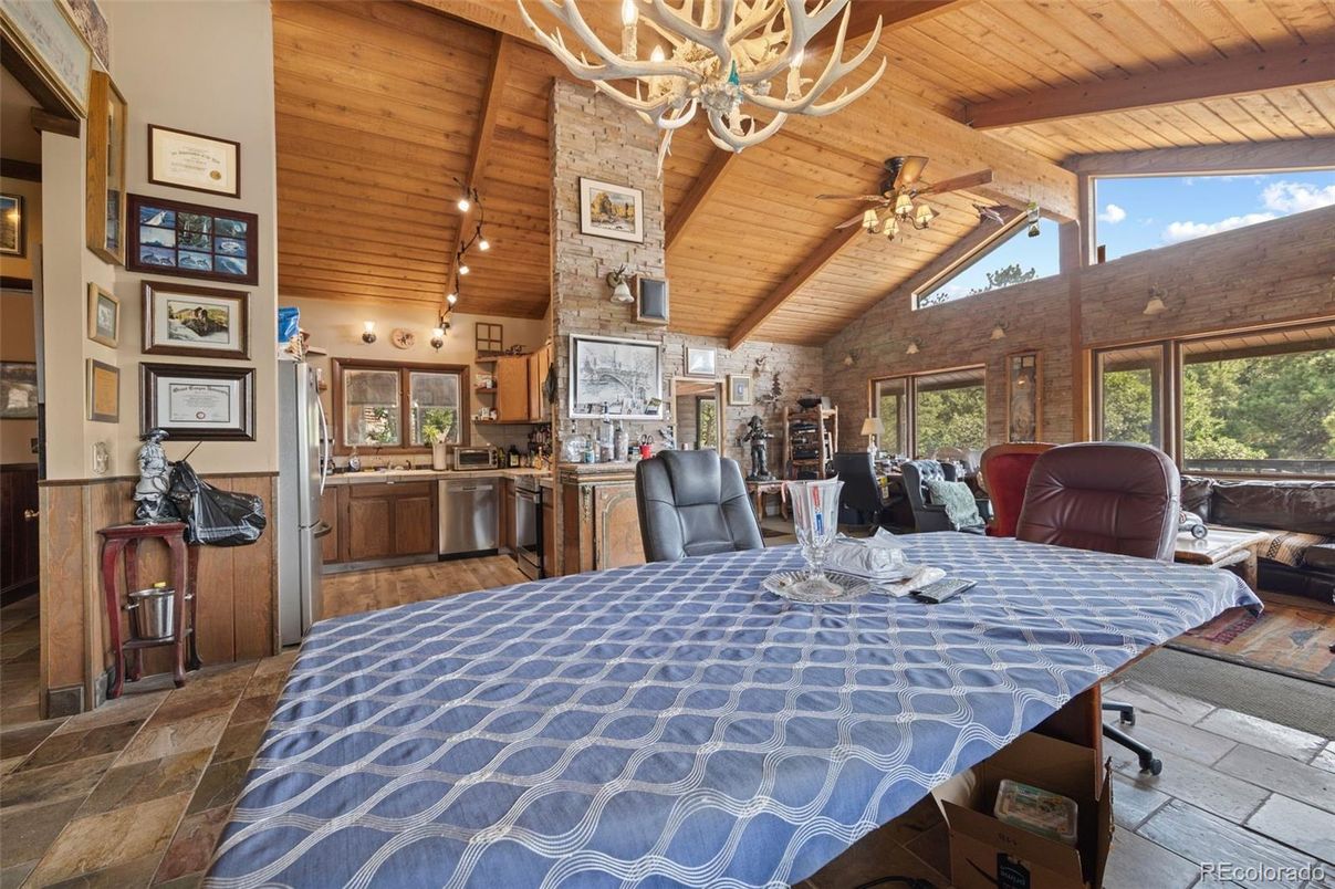 Chandelier, Interior, Kitchen, Living room, Stainless Steel Appliances, Stone Walls, Wooden Beams, Wooden Ceilings