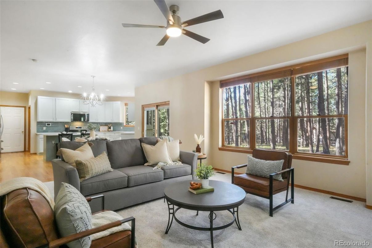 Chandelier, Dining room, Interior, Kitchen, Living room, Recessed Lighting, Stainless Steel Appliances, Wood Texture Flooring