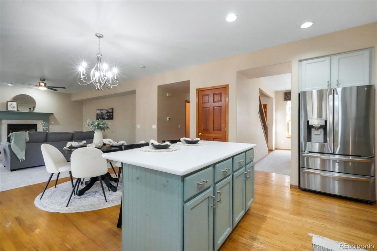 Chandelier, Dining room, Interior, Kitchen, Recessed Lighting, Stainless Steel Appliances, Wood Texture Flooring