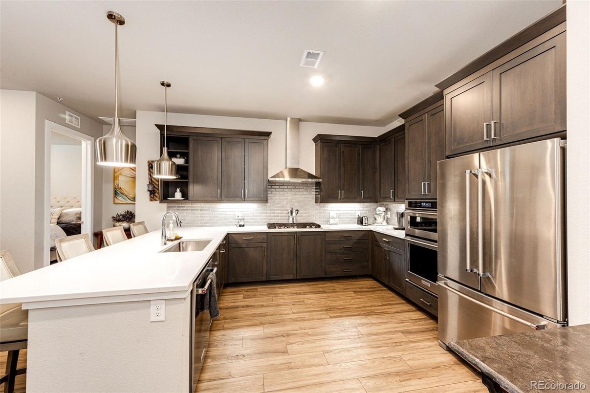 Interior, Kitchen, Pendant Lights, Recessed Lighting, Stainless Steel Appliances, Wood Texture Flooring