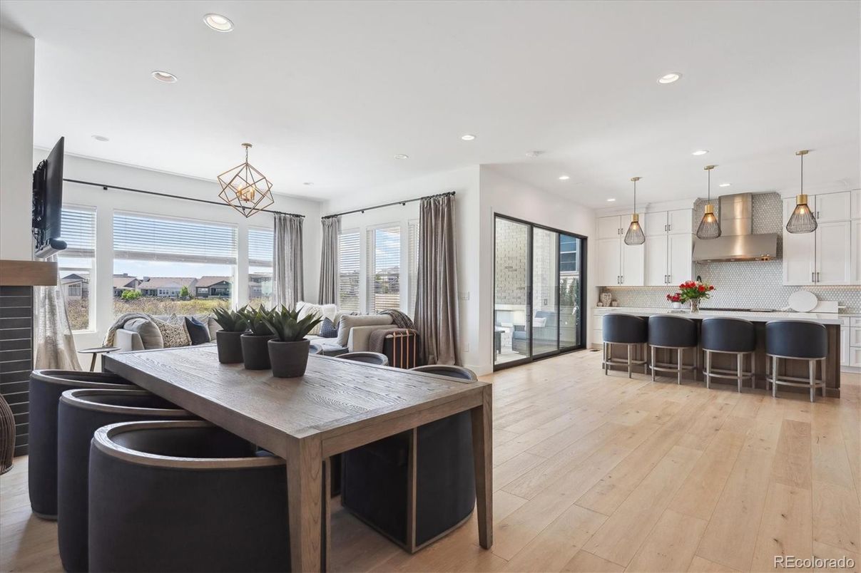 Dining room, Interior, Kitchen, Pendant Lights, Recessed Lighting, Stainless Steel Appliances, Wood Texture Flooring