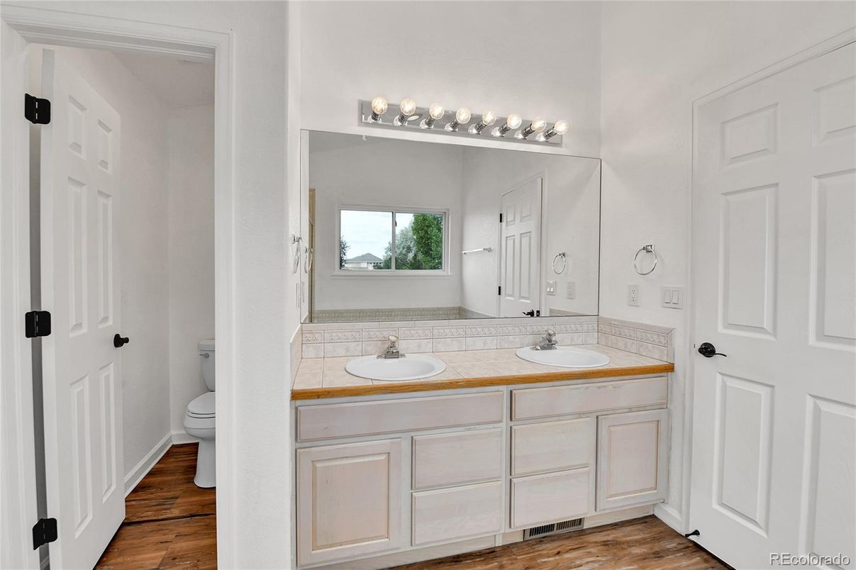 Bathroom, Dual Sink Vanities, Interior, Tile Countertops, Wood Texture Flooring