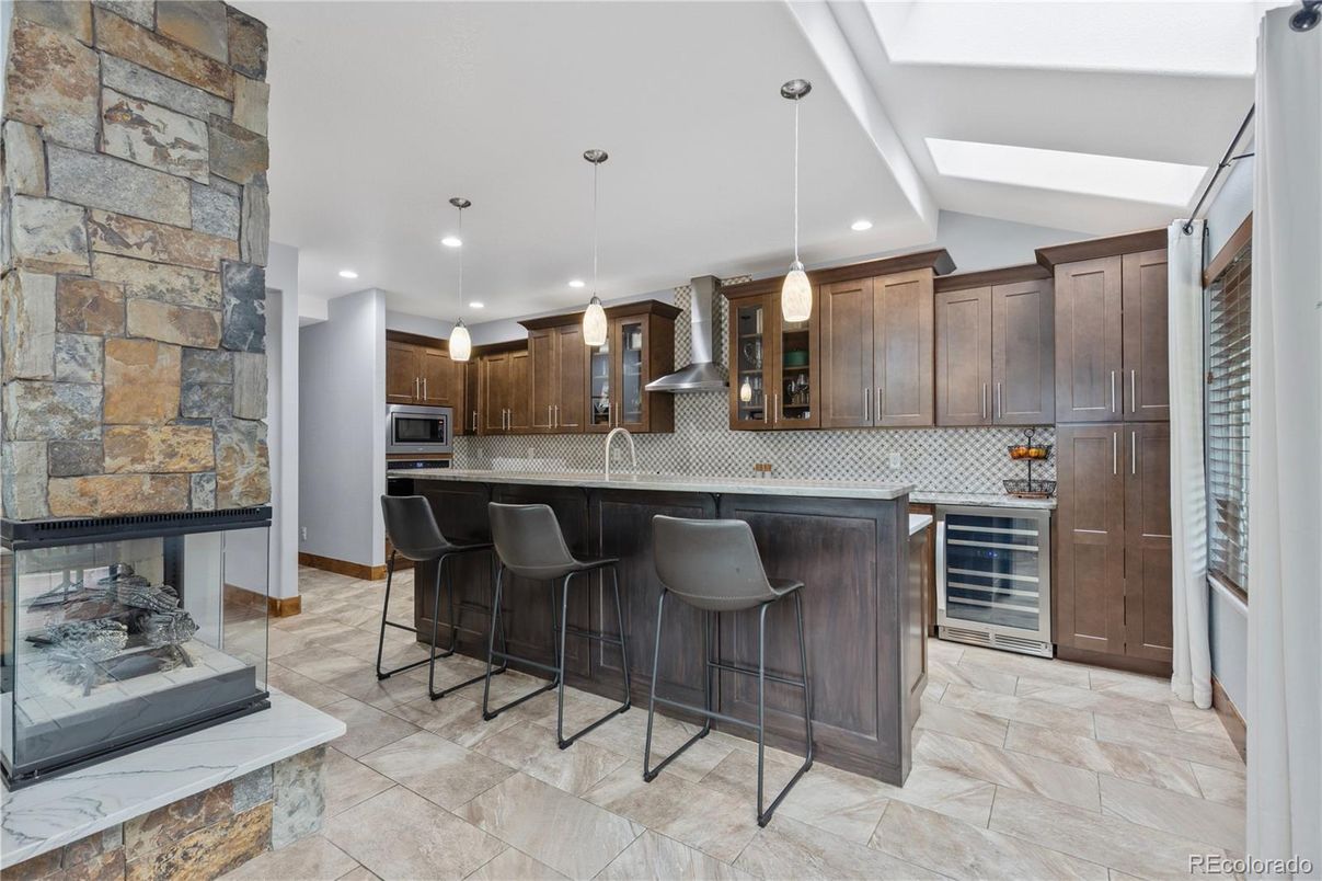Interior, Kitchen, Pendant Lights, Recessed Lighting, Stainless Steel Appliances, Stone Walls