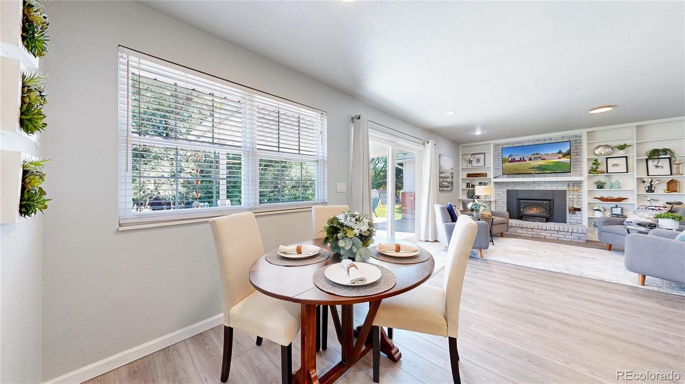 Dining room, Fireplace, Interior, Living room, Recessed Lighting, Wood Texture Flooring