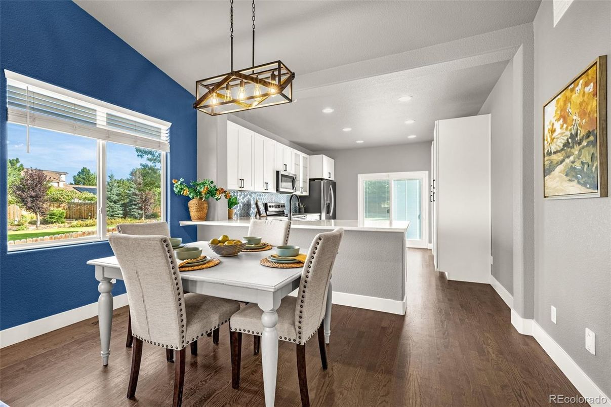 Dining room, Interior, Kitchen, Pendant Lights, Recessed Lighting, Stainless Steel Appliances, Wood Texture Flooring