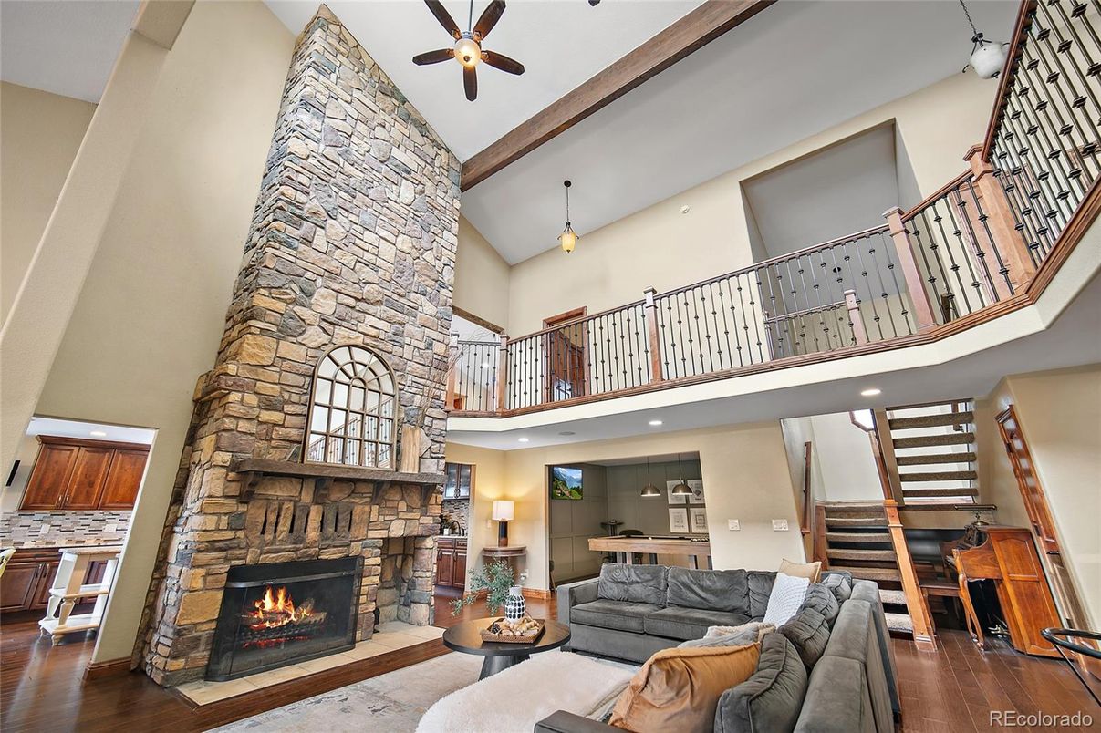 Fireplace, Interior, Living room, Pendant Lights, Recessed Lighting, Stone Walls, Wooden Beams, Wood Texture Flooring