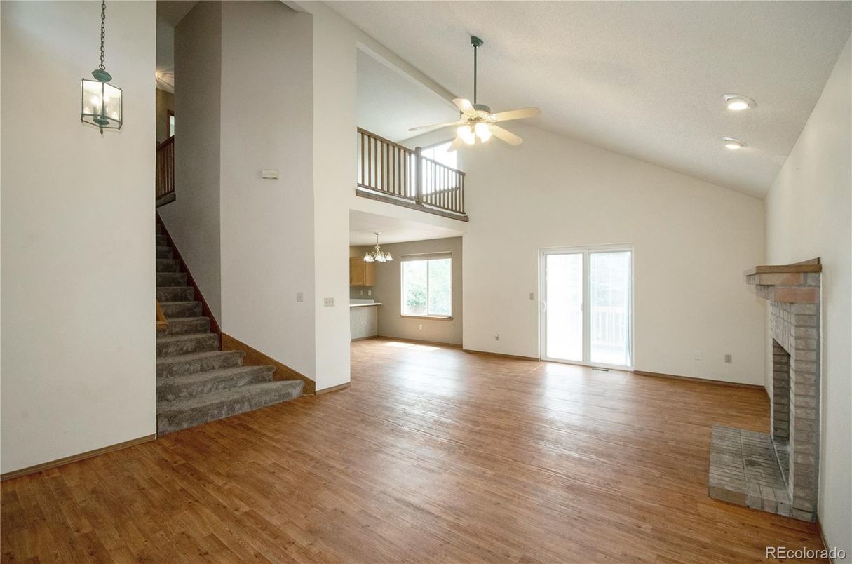 Fireplace, Interior, Pendant Lights, Recessed Lighting, Wood Texture Flooring