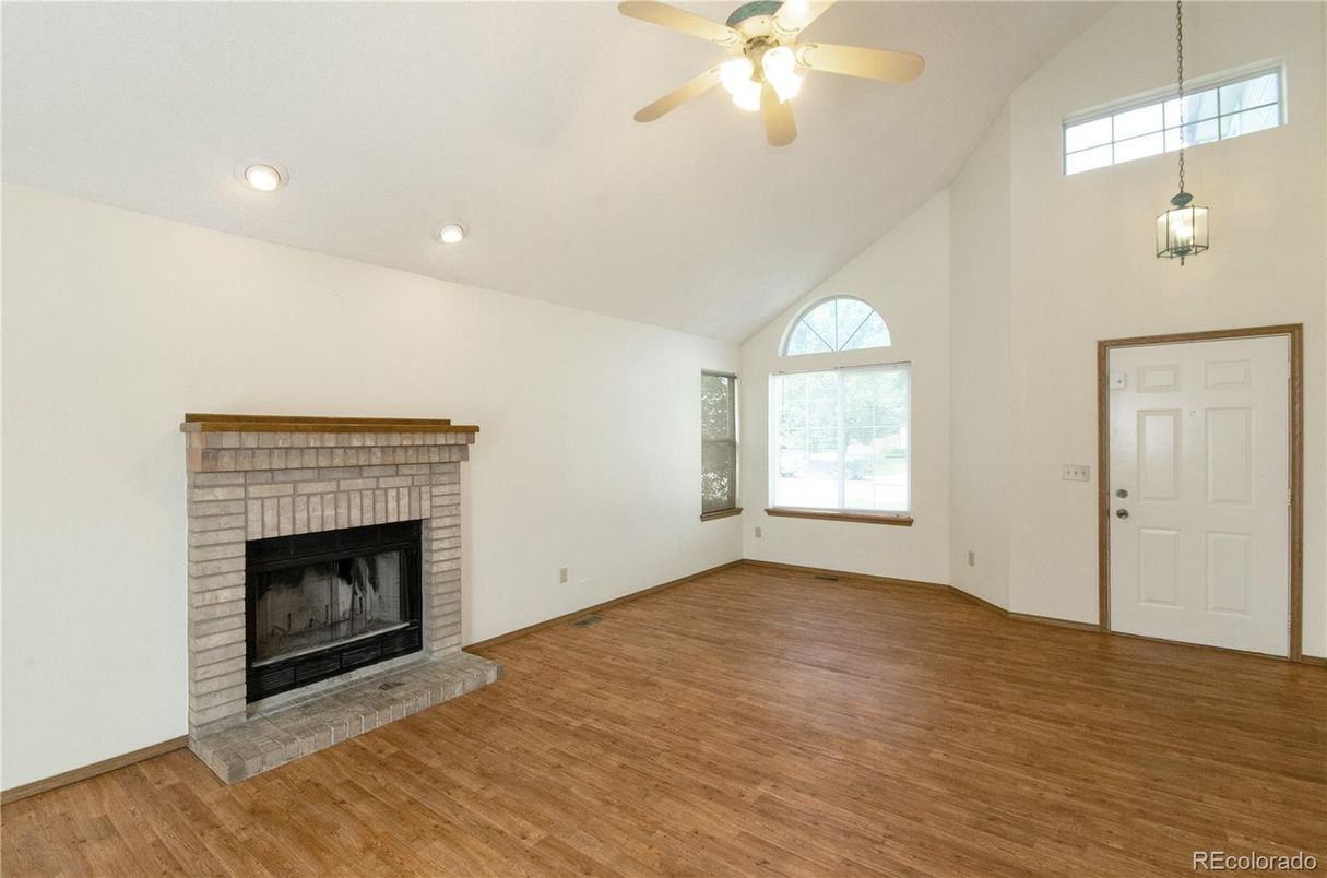 Empty room, Fireplace, Interior, Pendant Lights, Recessed Lighting, Wood Texture Flooring