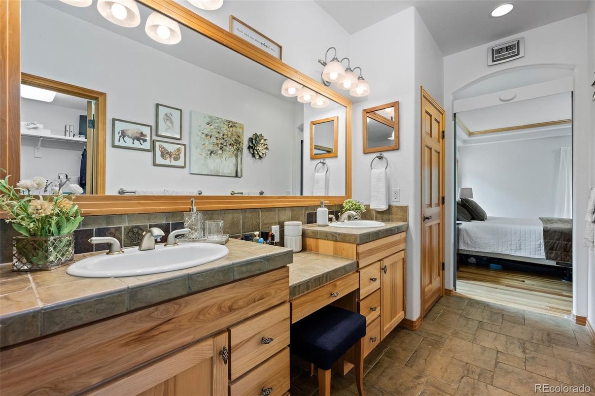 Bathroom, Bedroom, Dual Sink Vanities, Interior, Recessed Lighting, Tile Countertops, Wood Texture Flooring