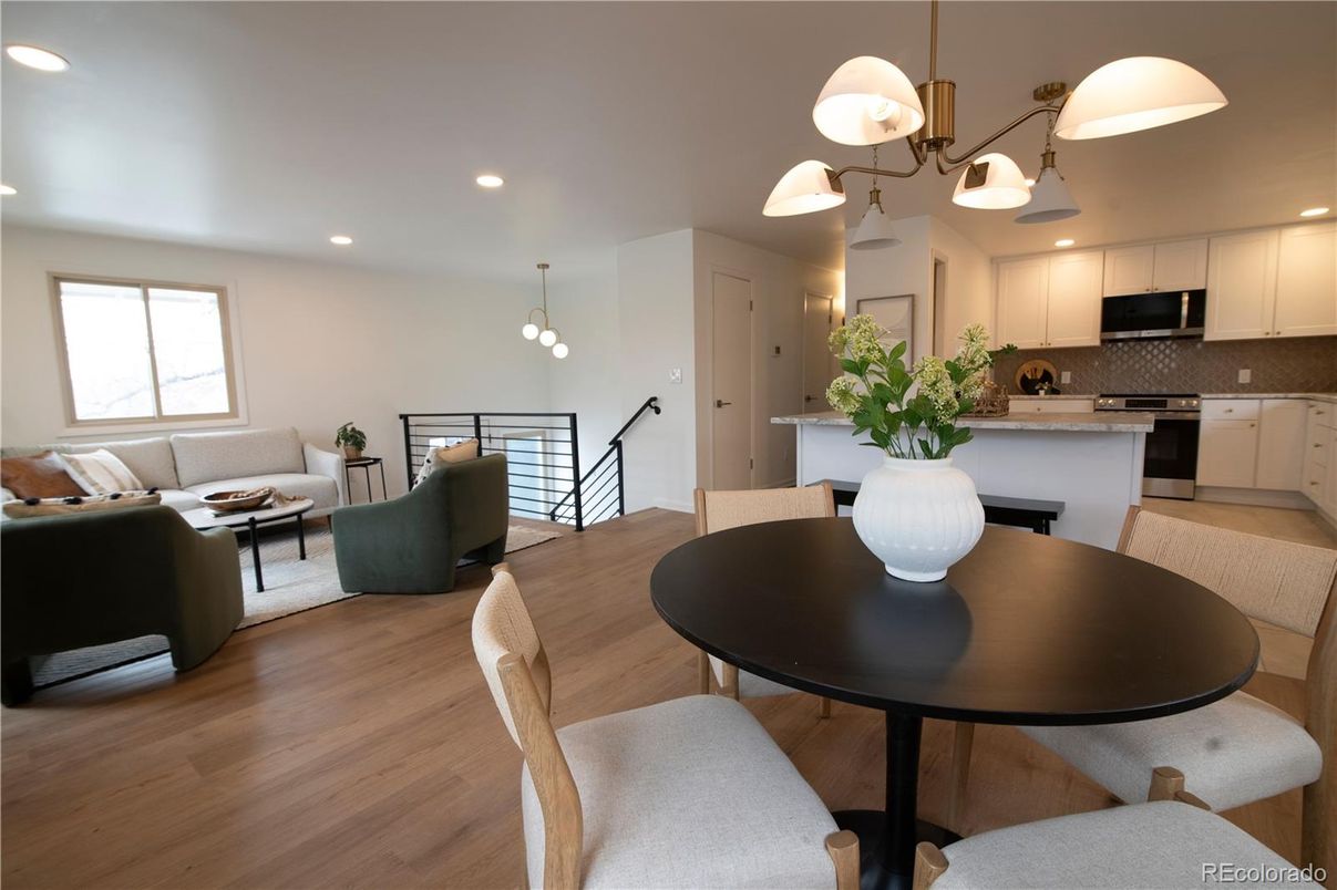 Dining room, Interior, Kitchen, Living room, Pendant Lights, Recessed Lighting, Stainless Steel Appliances, Wood Texture Flooring