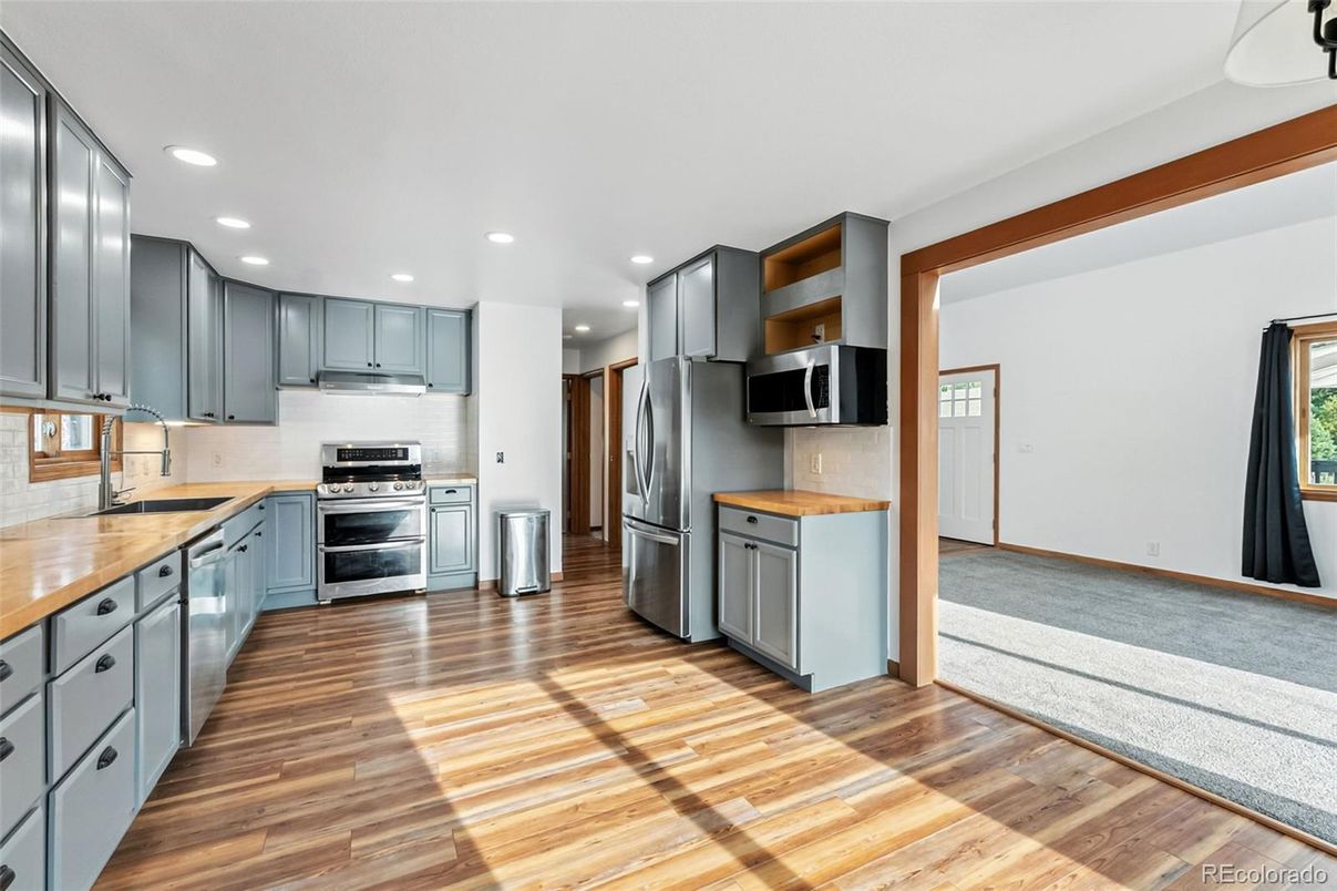 Interior, Kitchen, Recessed Lighting, Stainless Steel Appliances, Wood Texture Flooring