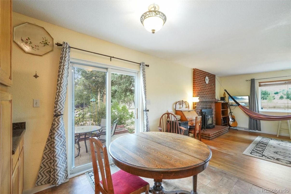 Dining room, Fireplace, Interior, Stone Walls, Wood Texture Flooring