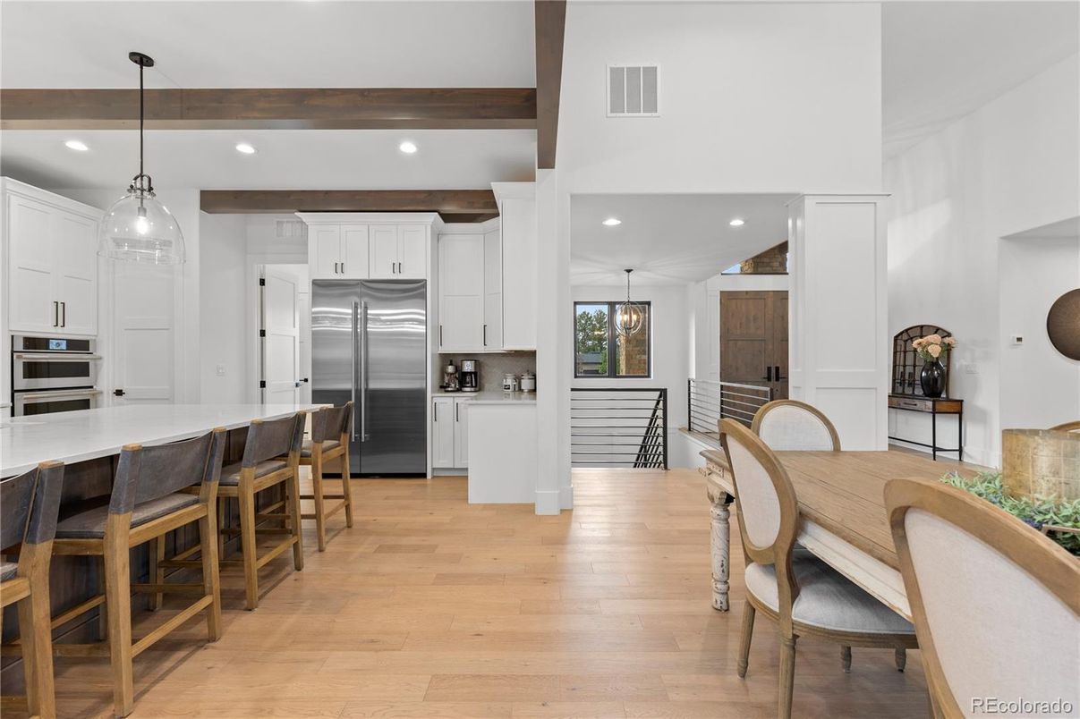 Dining room, Interior, Kitchen, Pendant Lights, Recessed Lighting, Stainless Steel Appliances, Wooden Beams, Wood Texture Flooring