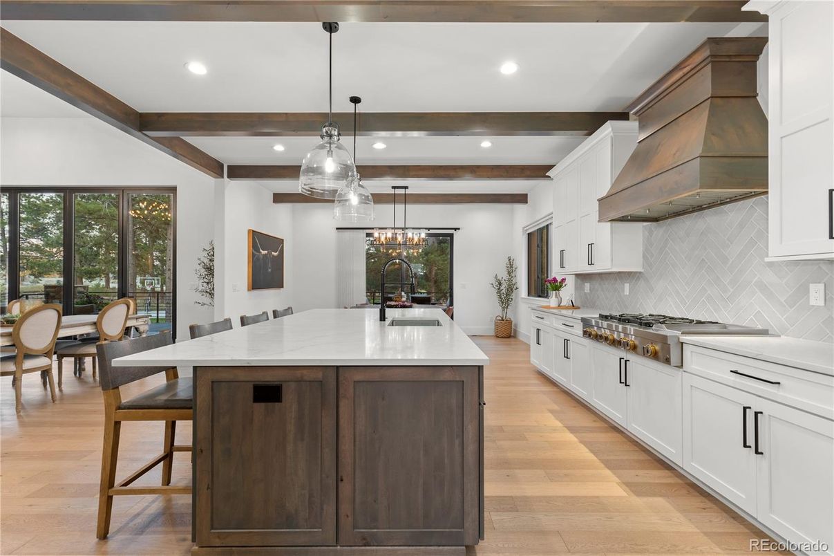 Dining room, Interior, Kitchen, Pendant Lights, Recessed Lighting, Stainless Steel Appliances, Wooden Beams, Wood Texture Flooring
