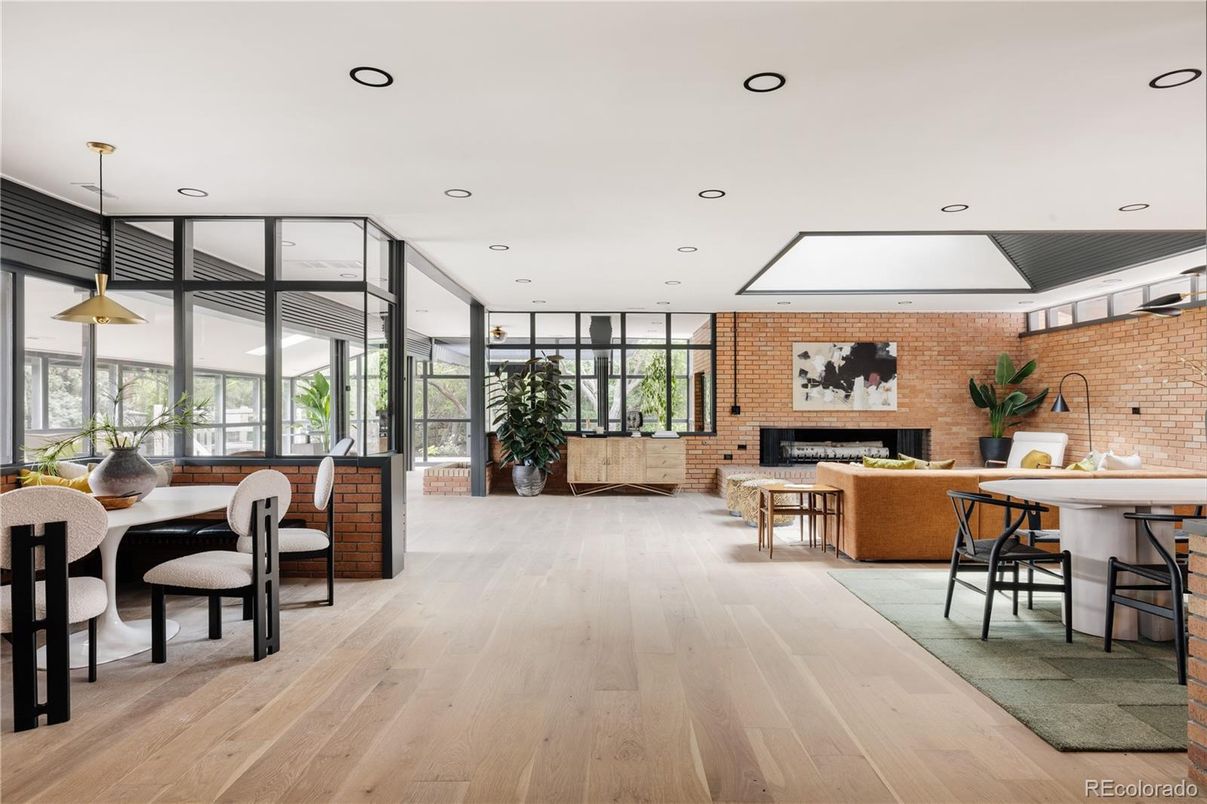 Dining room, Fireplace, Interior, Pendant Lights, Recessed Lighting, Stone Walls, Wood Texture Flooring