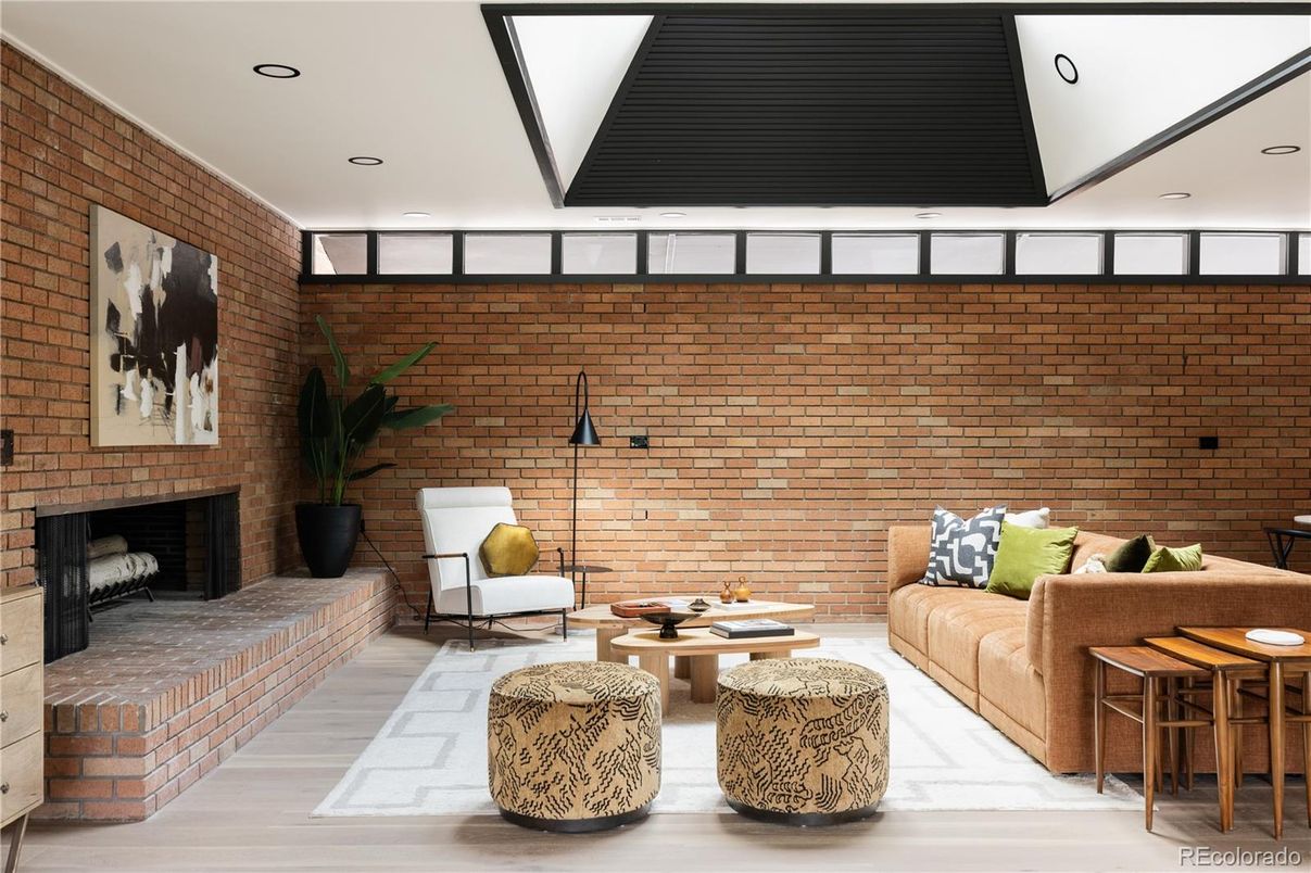 Fireplace, Interior, Living room, Recessed Lighting, Stone Walls, Wood Texture Flooring