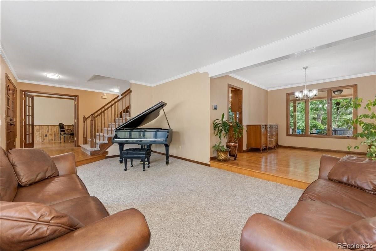 Chandelier, Interior, Living room, Piano, Recessed Lighting, Wood Texture Flooring
