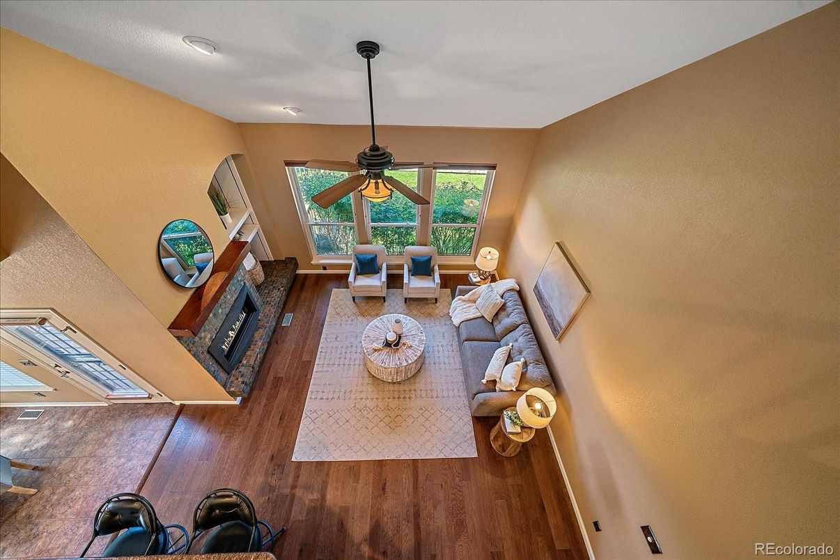 Dining room, Fireplace, Interior, Living room, Recessed Lighting, Wood Texture Flooring