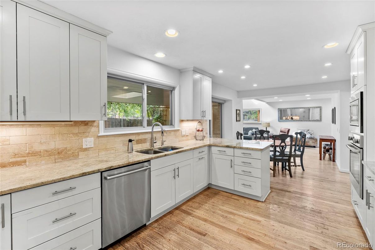 Dining room, Interior, Kitchen, Recessed Lighting, Stainless Steel Appliances, Wood Texture Flooring