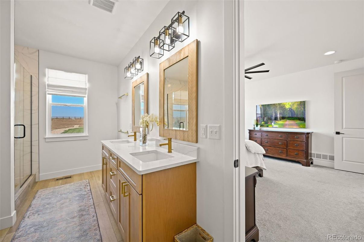 Bathroom, Dual Sink Vanities, Glass Shower, Interior, Recessed Lighting, Wood Texture Flooring