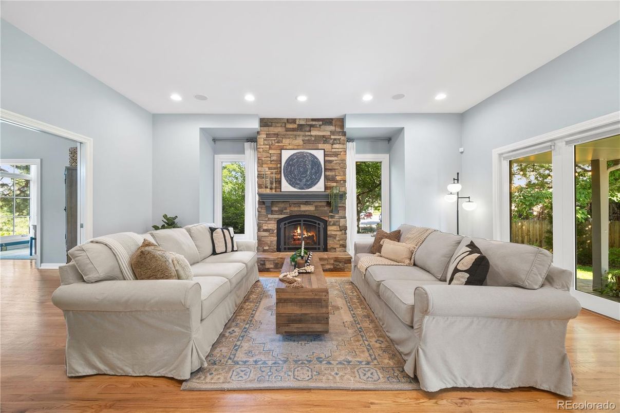Fireplace, Interior, Living room, Recessed Lighting, Stone Walls, Wood Texture Flooring