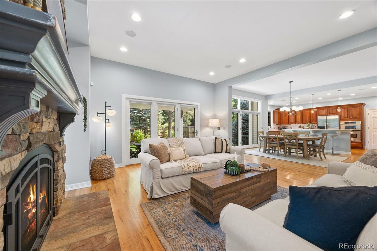 Dining room, Fireplace, Interior, Kitchen, Living room, Pendant Lights, Recessed Lighting, Stainless Steel Appliances, Wood Texture Flooring