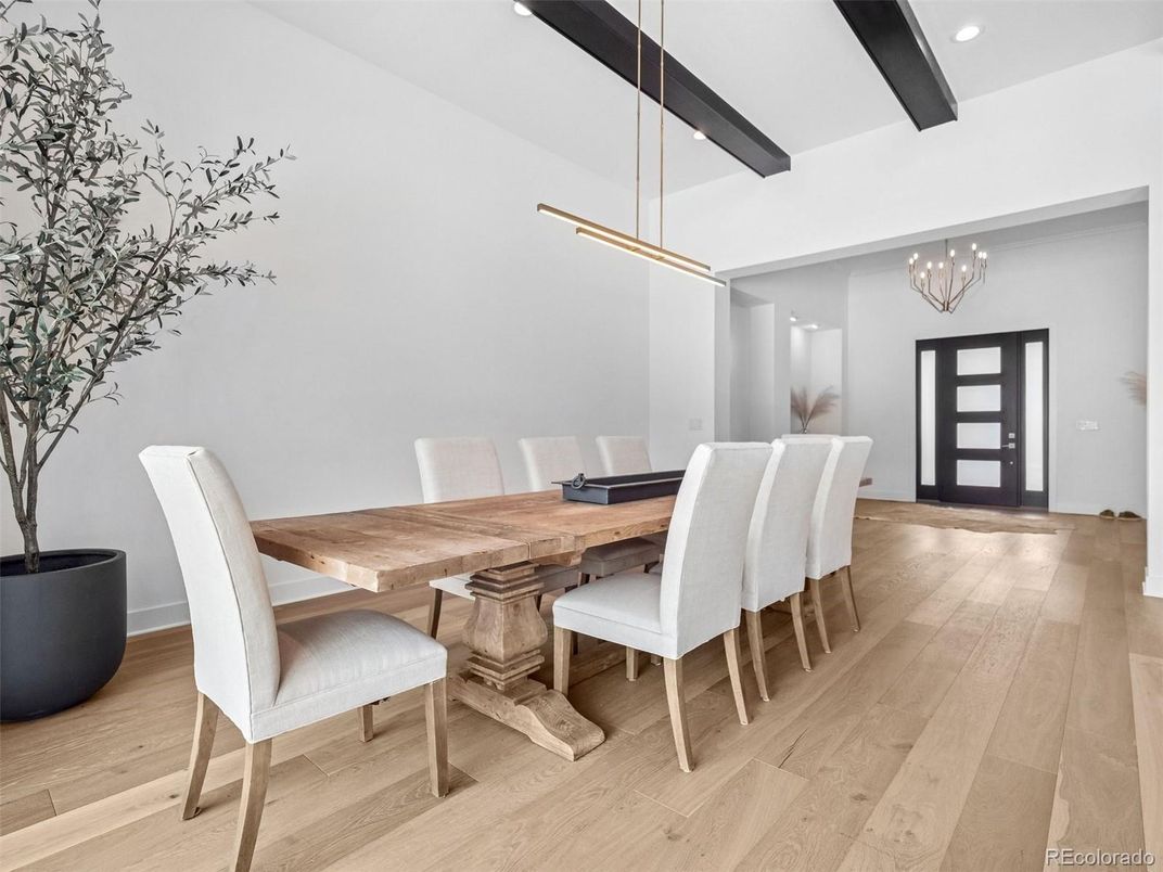 Chandelier, Dining room, Interior, Pendant Lights, Recessed Lighting, Wooden Beams, Wood Texture Flooring