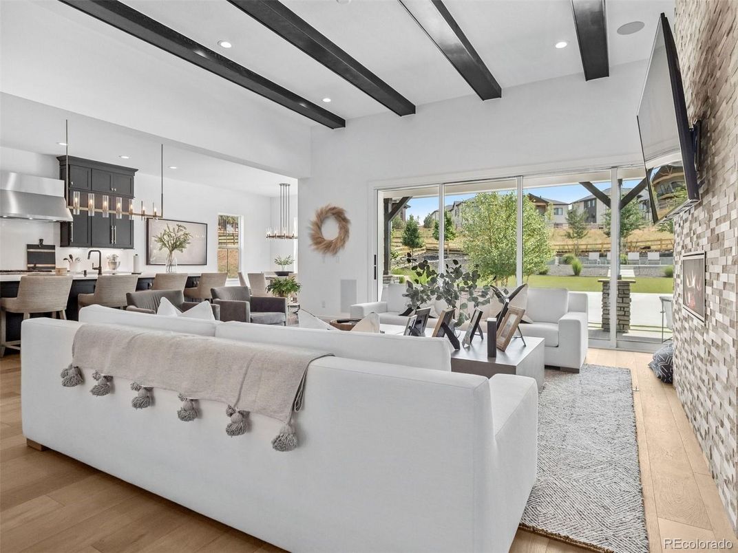 Dining room, Interior, Kitchen, Living room, Pendant Lights, Recessed Lighting, Stainless Steel Appliances, Wooden Beams, Wood Texture Flooring