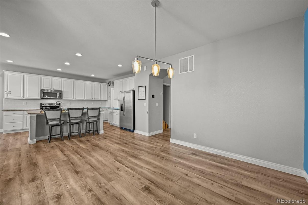 Interior, Kitchen, Pendant Lights, Recessed Lighting, Stainless Steel Appliances, Wood Texture Flooring