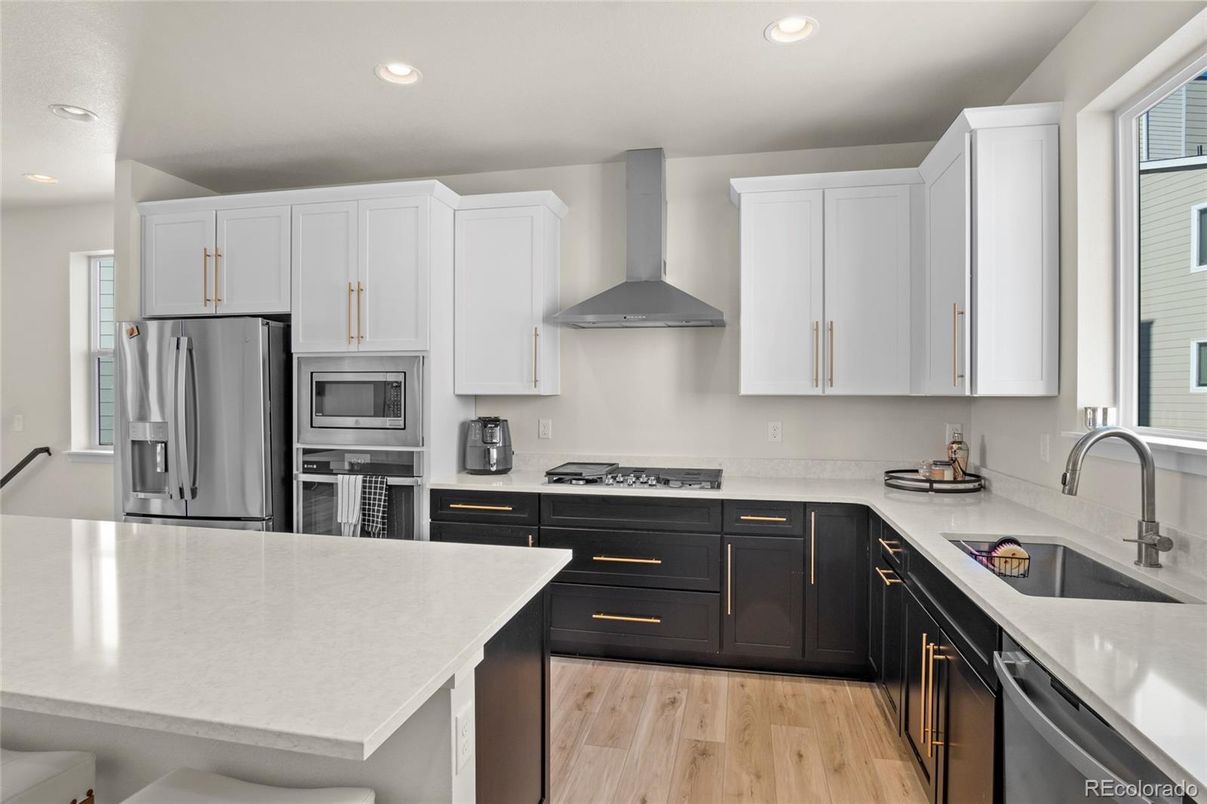 Interior, Kitchen, Recessed Lighting, Stainless Steel Appliances, Wood Texture Flooring
